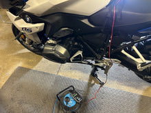 Load image into Gallery viewer, HTRC Battery Charger charging a BMW R1200RS battery in the BarMoto Workshop