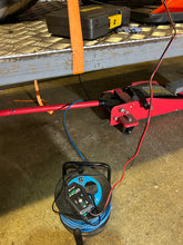 Load image into Gallery viewer, HTRC Motorcycle Battery Charger in use in the BarMoto Workshop